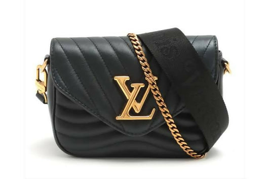 The EXCHANGE Louis Vuitton Multi Wave Porchette Black features quilted calf leather, a gold LV logo, gold chain details, and a wide black fabric shoulder strap.