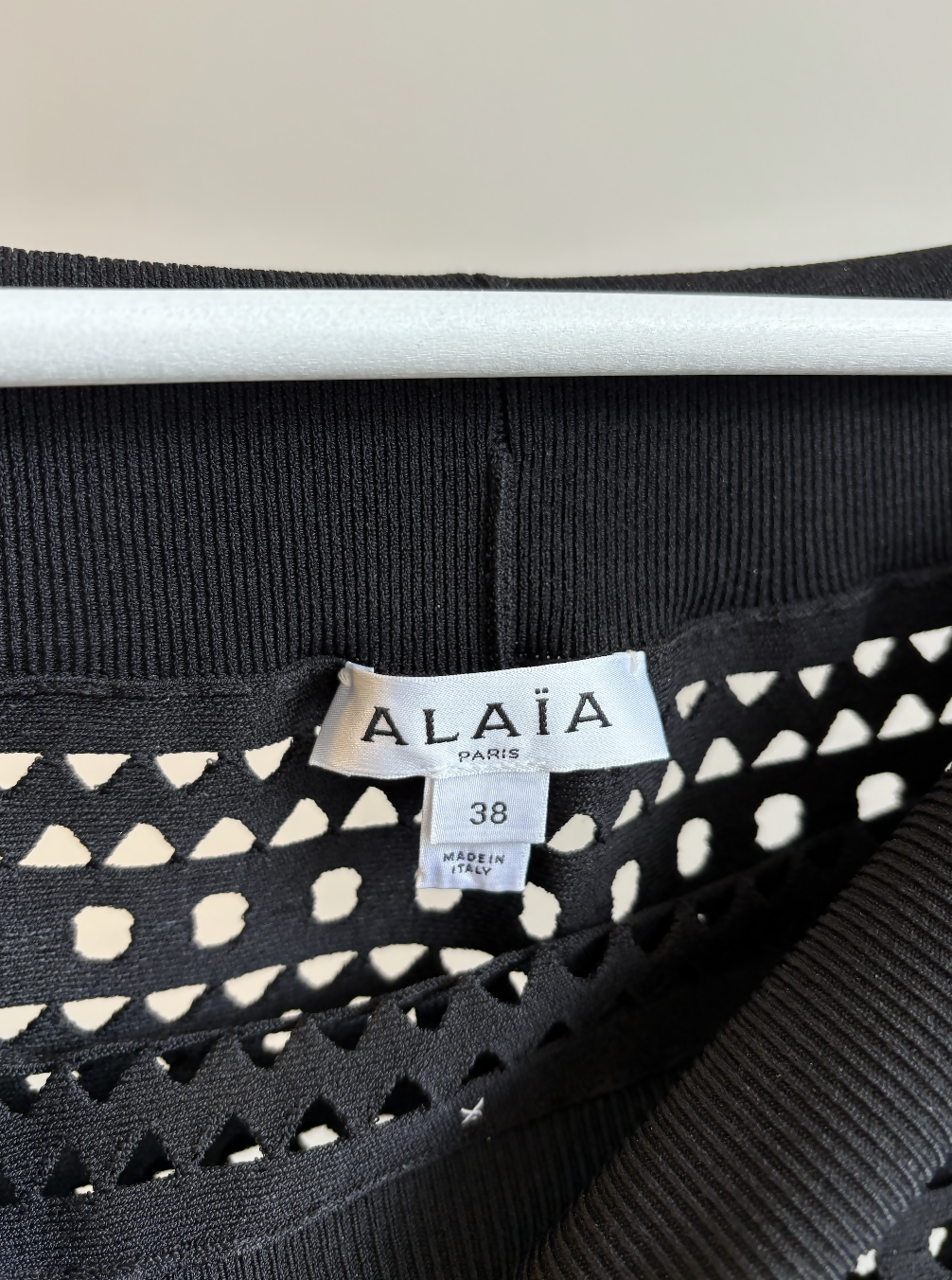 Alaïa Open-Knit Off-Shoulder Longsleeved Top