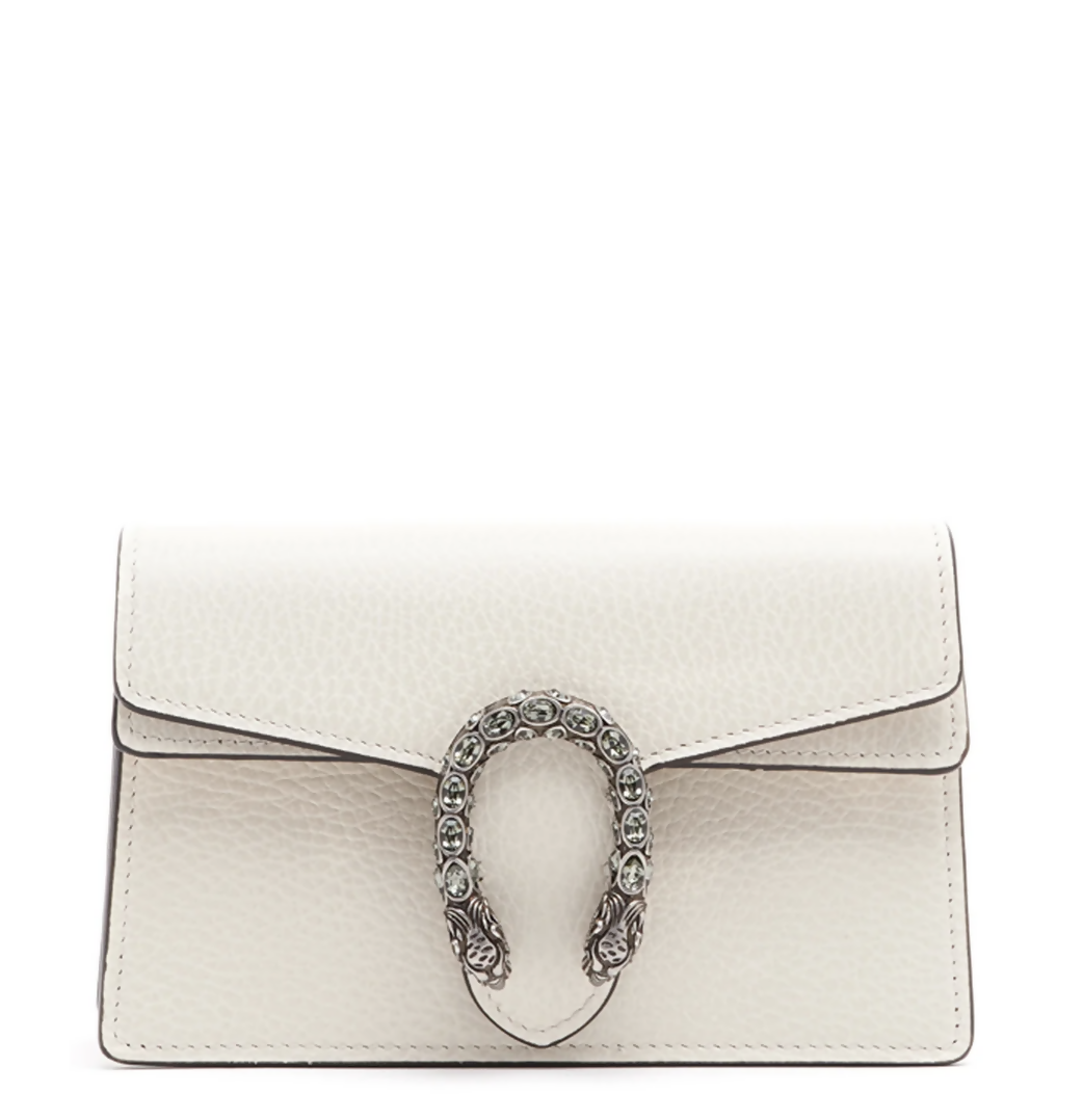 The EXCHANGE Gucci Dionysus Super Mini Crossbody Bag is a small white Italian-crafted calf leather bag featuring a textured finish, flap closure, and a silver horseshoe buckle with dual tiger head details.