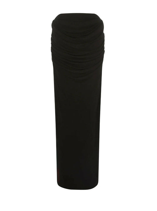 The EXCHANGE Paris Georgia Raffy Draped Skirt is a long black knit skirt with a high waist, ruched hip detailing, fitted silhouette, and straight hem for an effortlessly chic style.