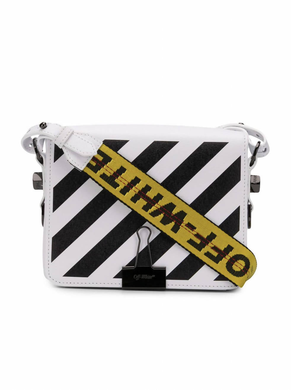 The EXCHANGE Off-White diagonal stripe crossbody bag features bold black stripes, a signature yellow strap, and a large metal clip accent on the front.