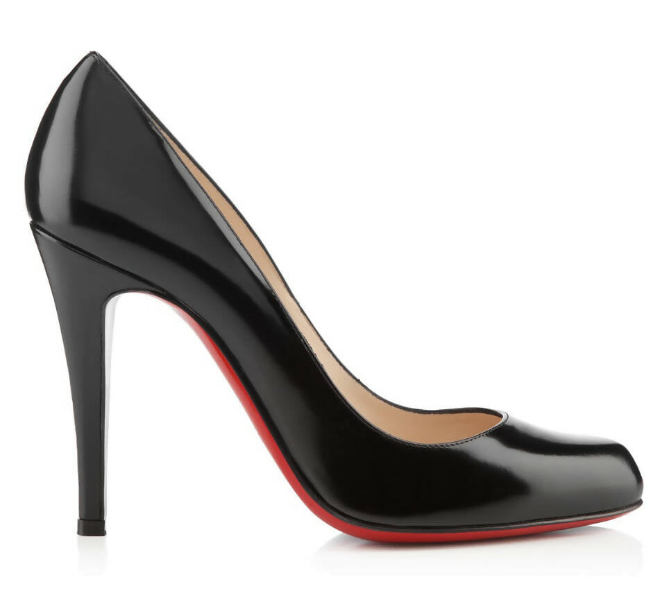 A black patent leather high-heeled pump with a pointed toe and signature red sole, the EXCHANGE Christian Louboutin Decolette Jazz Calf is shown in profile against a white background.
