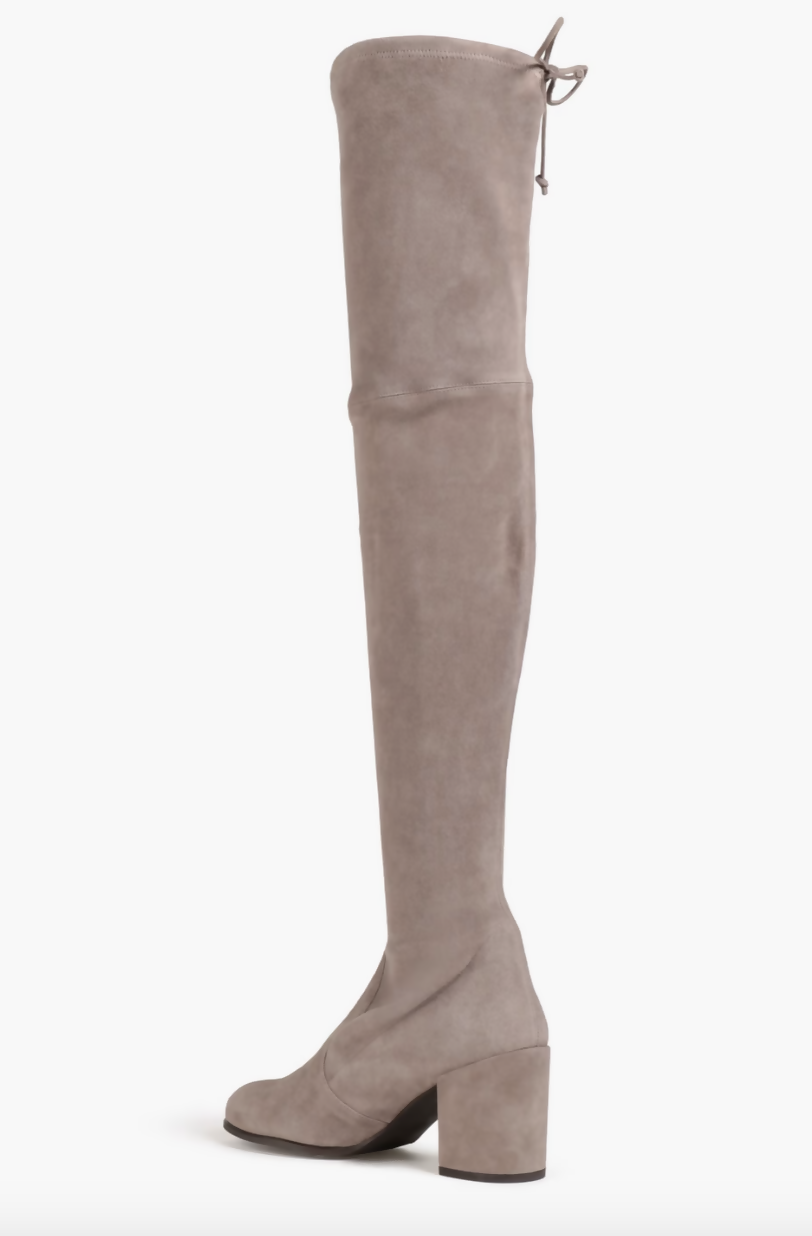 A single EXCHANGE STUART WEITZMAN suede thigh boot in Mushroom, size 38.5/39, featuring an over-the-knee design, chunky block heel, and a stylish tie detail at the top.