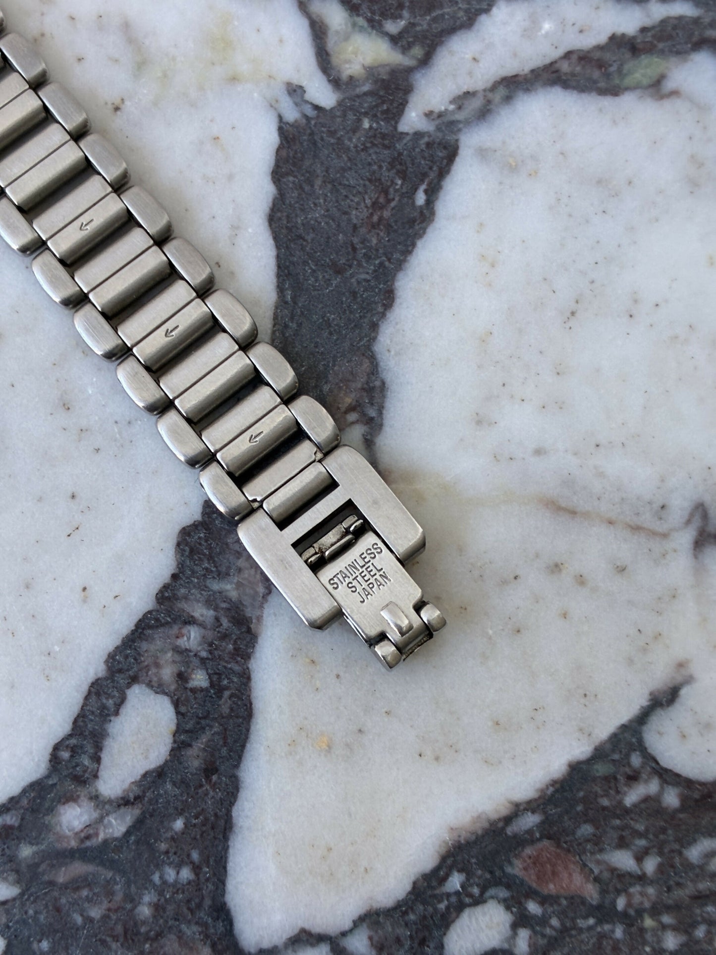 Yves Saint Laurent Bi-Tone Sunburst Dial Watch