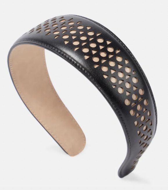 The Alaïa Vienne Laser-Cut Leather Headband - FULL SET by EXCHANGE STORE features black leather with tan lining and distinctive Vienne laser-cut oval details along the top and sides.