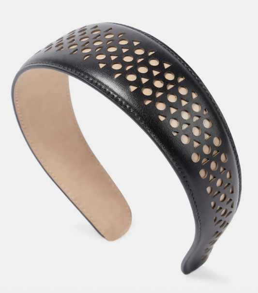 The Alaïa Vienne Laser-Cut Leather Headband - FULL SET by EXCHANGE STORE features black leather with tan lining and distinctive Vienne laser-cut oval details along the top and sides.