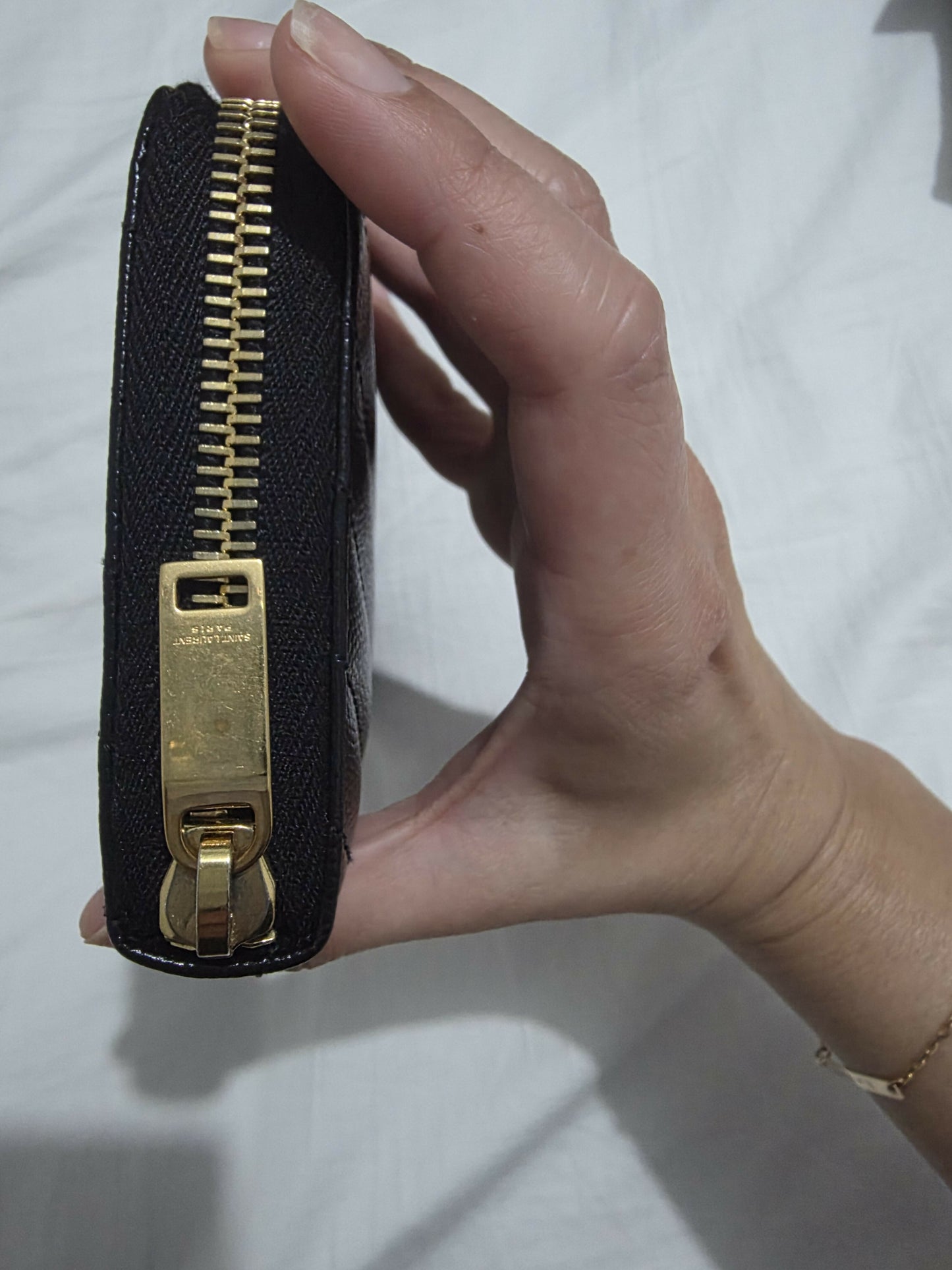 SAINT LAURENT CASSANDRE MATELASSÉ ZIP AROUND WALLET