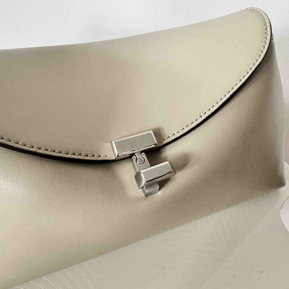 Toteme T-Lock Leather Clutch & Crossbody Bag