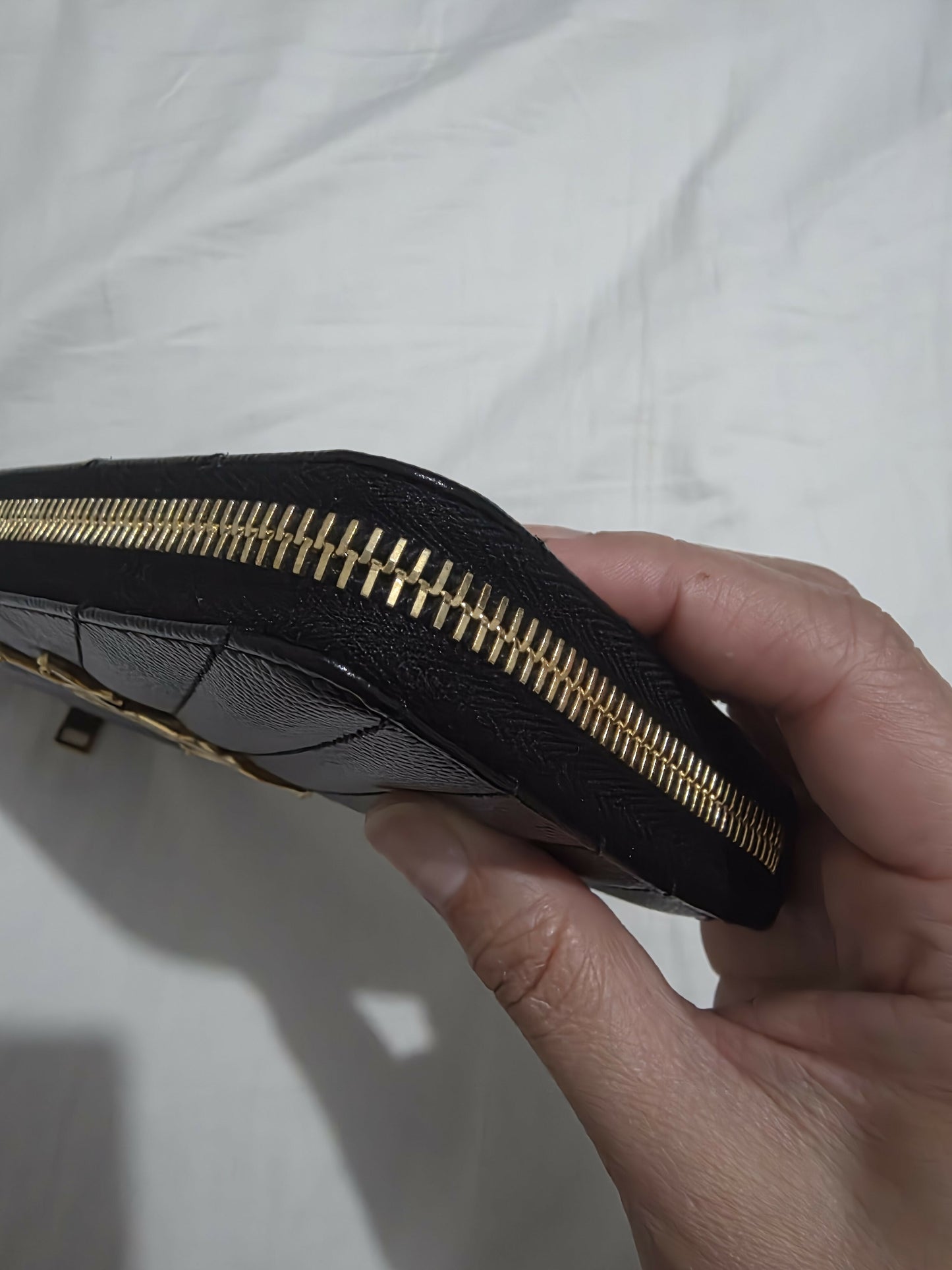 SAINT LAURENT CASSANDRE MATELASSÉ ZIP AROUND WALLET