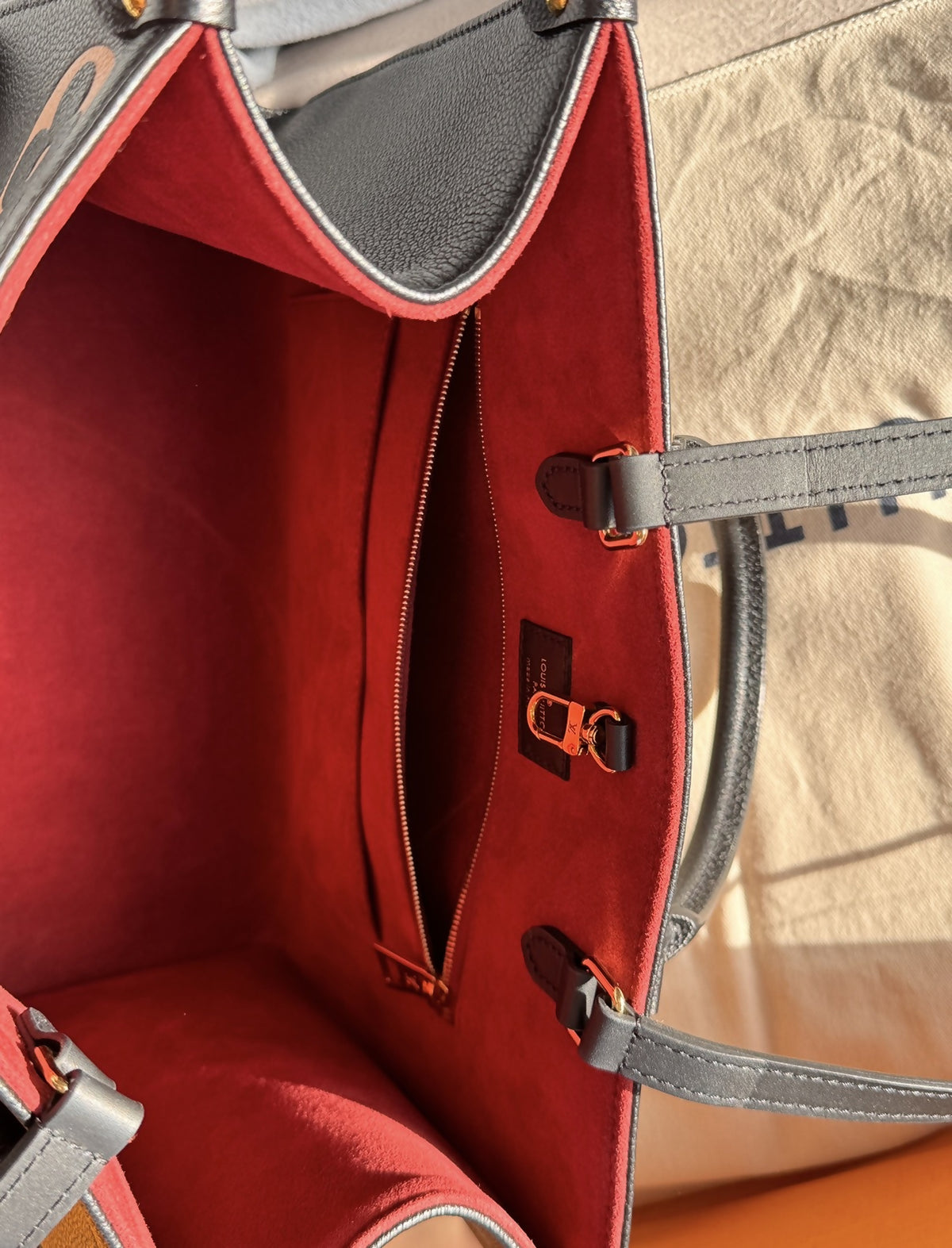 Louis Vuitton OnTheGo MM empriente leather