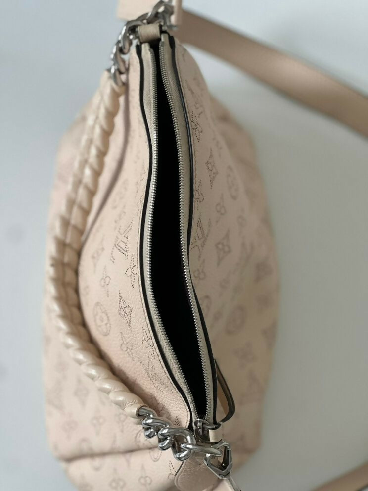 Louis Vuitton Babylon Leather Handbag